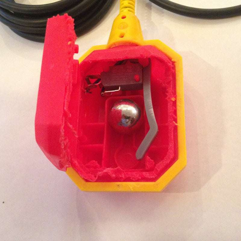 grinder pump float switch debris obstruction